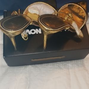 After 5 Gold sandals.